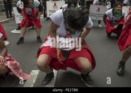 Lima, Peru. 11th Aug, 2018. Demonstrators perform during a Ni Una Menos (Not One Less) rally in protest of gender based violence in Lima. Ni Una Menos (Not One Less) demands that women should be protected from violent deaths at the hands of men in Peru. Credit: Guillermo Gutierrez/SOPA Images/ZUMA Wire/Alamy Live News Stock Photo