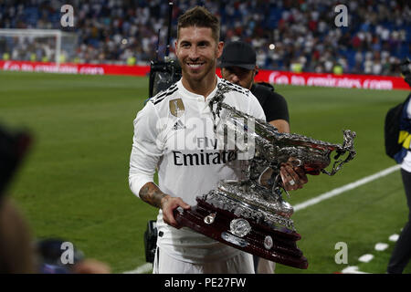 Madrid, Madrid, Spain. 11th Aug, 2018. Captain of Real Madrid Sergio Ramos stand the Santiago Bernabéu Trophy after winning the friendly match between Real Madrid CF and AC Milan at Estadio Santiago Bernabeu. Credit: Manu Reino/SOPA Images/ZUMA Wire/Alamy Live News Stock Photo