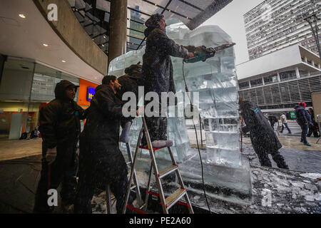 São Paulo, Brazil. 12th Aug, 2018. A huge elephant-shaped ice sculpture nearly 3 meters high and 6 tons melting outdoors is seen in Paulista avenue in Sao Paulo on August 12, 2018. It is an action to draw attention to the day of the elephant, the idea of ''‹''‹the cold intervention is to warn about the risk of extinction of the species. Credit: Dario Oliveira/ZUMA Wire/Alamy Live News Stock Photo