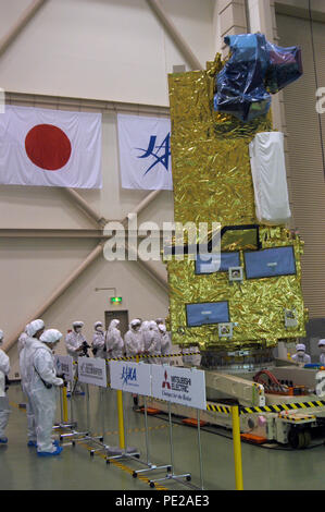 Tsukuba, Japan. 11th Aug, 2018. Journalists and staff of the Japanese space agency Jaxa attend the presentation of the satellite 'Ibuki-2', meaning 'breath' in English, in the so-called Clean Room of the Jaxa Tsukuba Space Center in the research city Tsukuba near Tokyo. Credit: Lars Nicolaysen/dpa/Alamy Live News Stock Photo