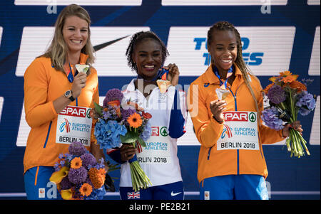Berlin, Germany. 12th Aug, 2018. Track and Field, European Championship, Award Ceremony on the European Mile at Breitscheidplatz, 200m, Women: Silver medallist Dafne Schippers (l-r) from the Netherlands, gold medallist Dina Asher-Smith from Great Britain and bronze medallist Jamile Samuel from the Netherlands. Credit: Action Plus Sports/Alamy Live News
