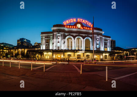 Panoramic view of vintage Union Station transportation center at dusk with streaking lights and bright lamps on August 9, 2018 in Lodo, Denver. Stock Photo