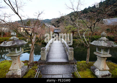 Stone bridge with two stone lanterns at the Shogaku-in Temple in Kyoto, Japan. Stock Photo