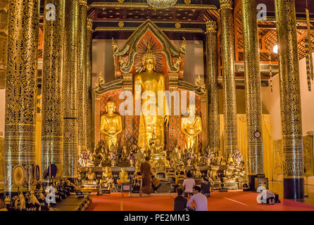 Golden Buddha inside Wat Chedi Luang, Chiang Mai, Northern Thailand Stock Photo