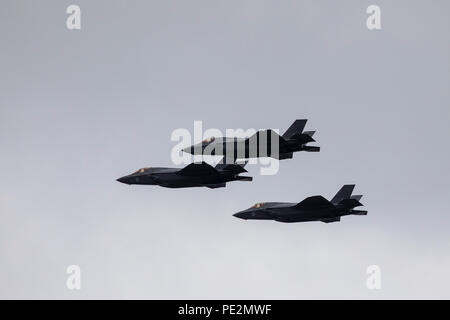 Three Lockheed Martin F-35 Lightning II fighter jets passing overhead in formation for the RAF100 London flypast Stock Photo