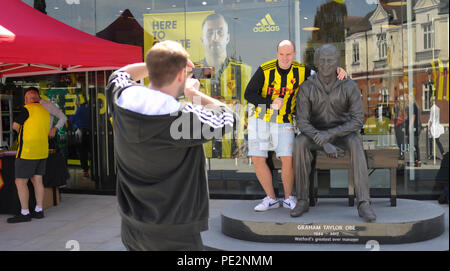 The new Graham Taylor statue by sculpture Douglas Jennings outside the club shop the Premier League match between Watford and Brighton and Hove Albion at Vicarage Road stadium. 11 August 2018   Editorial use only. No merchandising. For Football images FA and Premier League restrictions apply inc. no internet/mobile usage without FAPL license - for details contact Football Dataco Stock Photo
