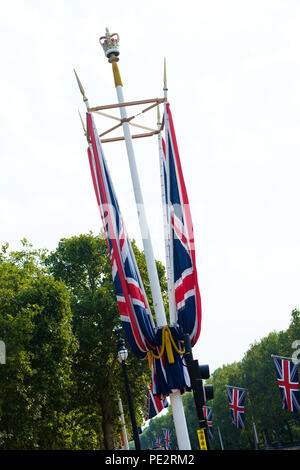 Union Jack flag tied to post at The Mall, London on Summer day Stock Photo