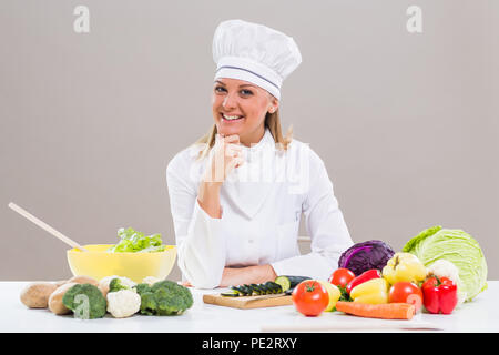 Portrait of female chef making healthy meal Stock Photo