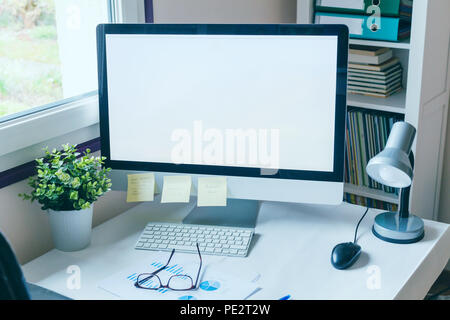 beautiful modern office workplace interior with computer with blank empty screen Stock Photo