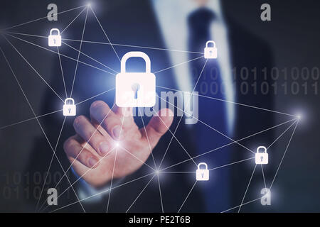internet network security concept, business man touching lock on virtual screen, protection against cyberattack Stock Photo