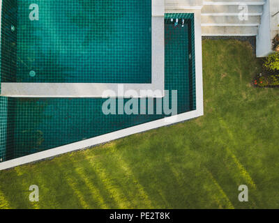 modern luxury villa with luxurious swimming pool, top view landscape of architecture exterior design Stock Photo