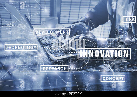 innovation concept, futuristic diagram background with technology, research and development  words, double exposure of hands typing on computer Stock Photo