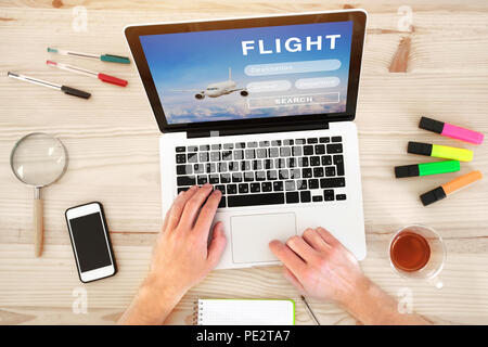 buy airplane ticket online, book flight on internet, travel transportation planning Stock Photo