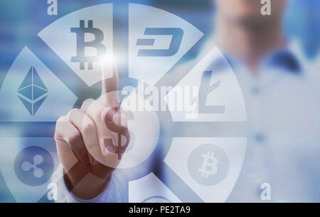 business man pressing buttons with bitcoin, litecoin and ethereum  on virtual touch screen interface, digital money concept, cryptocurrency Stock Photo