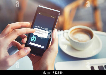 chatbot answering questions online, robot assistant help on website Stock Photo