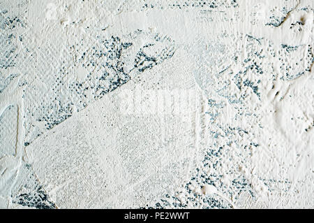 The original background of natural cement plaster on the blue textured wall with cracks Stock Photo