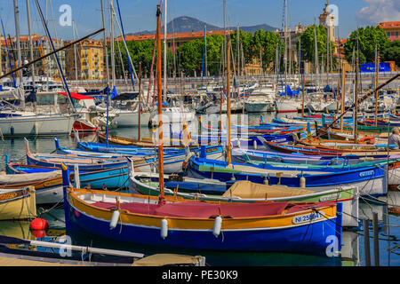 Nice, France - May 24, 2018: Old classic wooden boats and luxury yachts in Lympia port of Nice, Côte d'Azur Stock Photo