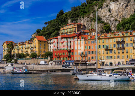Nice, France - May 24, 2018: View of luxury yachts and traditional Mediterranean buildings in Lympia port of Nice, Côte d'Azur Stock Photo