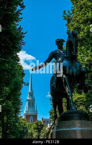 The Paul Revere Statue with the Old North Church in the background in the North End of Boston, Massachusetts Stock Photo