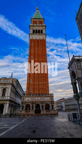 View of Saint Mark's Campanile on St. Mark (San Marco) square by the Doge's Palace in Venice, Italy at sunrise