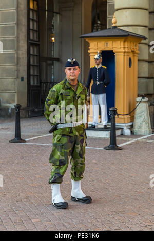 Stockholm, Sweden - August 11, 2017: Swedish armed forces officer in camouflage uniform at the changing of the guards ceremony outside the Royal Palac Stock Photo