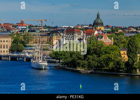 Stockholm, Sweden - August 11, 2017: View onto Stockholm old town and a tall ship on Lake Mälaren in Sweden Stock Photo