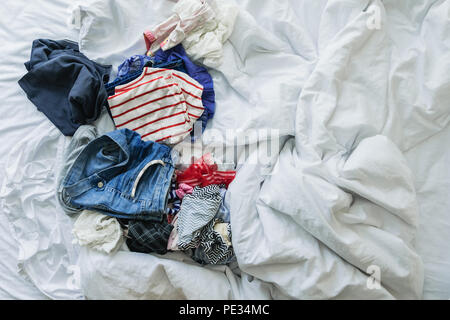 clothes thrown on the floor