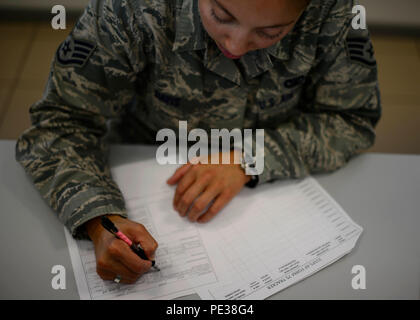 Security Forces personnel at the Visitor Control Center take ...