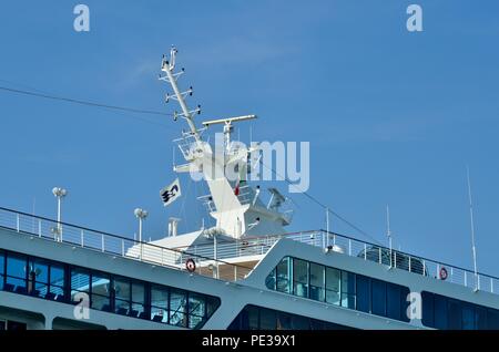 Close up of Italian & Zenith Princess logo flag flying against Blue sky on the mast of Zenith Princess at Venice Cruise Terminal, Venice, Italy Europe Stock Photo