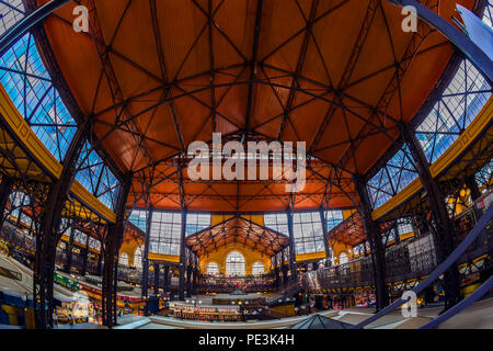 View of Grand Market hall beautifully constructed roof structure.The Central Market Hall is the largest indoor market in Budapest,it was built in 1897 Stock Photo