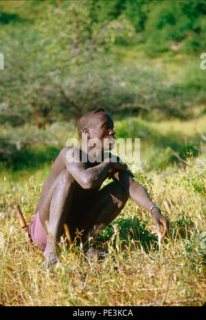 The Hadza people are click-speaking people, hunter gatherers, living in the region of Lake Eyasi, Tanzania. There are perhaps only 200 of them still l Stock Photo