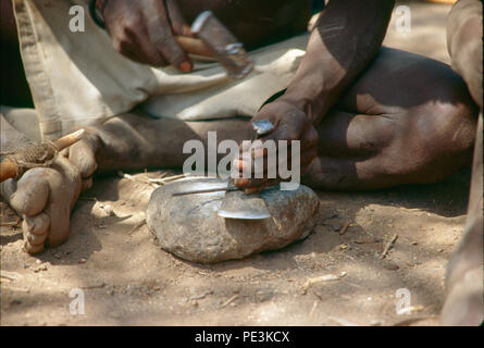 The Hadza people are click-speaking people, hunter gatherers, living in the region of Lake Eyasi, Tanzania. There are perhaps only 200 of them still l Stock Photo