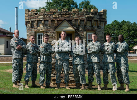 A U.S. Army Reserve team from the 680th Engineer Company, from Webster, N.Y., took third place at Sapper Stakes 2015 at Fort Chaffee, Ark., Sept. 2. From left: Sgt. Michael Dipaola, Sgt. Michael Barber, Spc. Joshua Miller, Staff Sgt. Kevin Guy, Spc. Daniel Trembath, Spc. Elliott Vitelli, Spc. Joseph Lynch and Pvt. Brandon Wilson. The competition is designed to build teamwork, enhance combat engineering skills and promote leadership among Army Reserve and National Guard combat engineering units. (U.S. Army photo by Master Sgt. Michel Sauret) Stock Photo