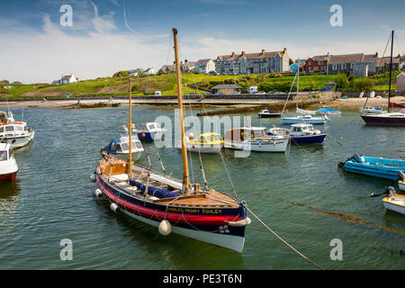 UK, Wales, Anglesey, Cemaes, historic sailing lifeboat Charles Henry Ashley moored in the harbour Stock Photo