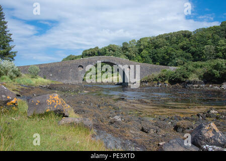 Clachan Bridge over the Atlantic on the Island of Seil near Oban in Argyll Scotland is a convenient stopping place on a trip out to Ellenabeich Stock Photo