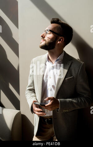 Pensive businessman at office Stock Photo