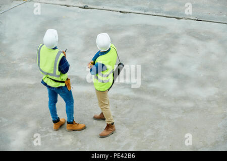 Unrecognizable building inspectors on construction site Stock Photo