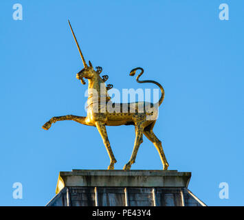 Gilded Unicorn finial - one of a pair of sculptures by David McFall on the roof of City Hall formerly the Council House in Bristol UK Stock Photo