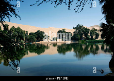 Natural lake and sand dunes of Huacachina. Ica District, Peru. Jul 2018 Stock Photo