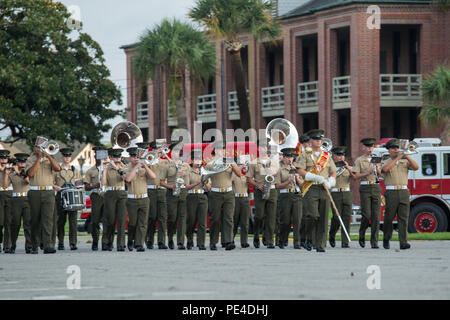 The Parris Island Marine Band plays before morning colors Sept. 11, 2015, on Parris Island, S.C. This ceremony brought together Marines and other emergency responders to remember those lost Sept. 11, 2001, when terrorist attacks claimed almost 3,000 lives. Stock Photo