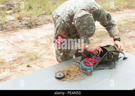 https://l450v.alamy.com/450v/pe4n50/north-carolina-army-national-guard-sapper-stakes-competitor-2nd-lt-wyatt-koch-inspects-his-equipment-before-performing-his-demolition-task-at-fort-bragg-nc-sept-12-2015-pe4n50.jpg