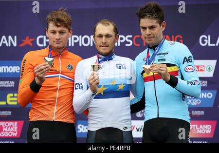 Silver medalist Netherland's Mathieu van der Poel (left), Gold medalist Italy's Matteo Trentin and Bronze medalist Belgium's Wout van Aert (right) on the podium for the Men's Road Race on day eleven of the 2018 European Championships in Glasgow. Stock Photo