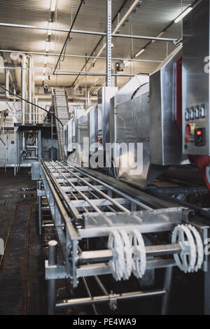 Industrial machinery interiors. Huge production hall of factory for ...