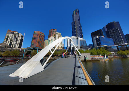 Southbank Pedestrian Bridge over the River Yarra and the Eureka Tower, Melbourne, Victoria, Australia Stock Photo