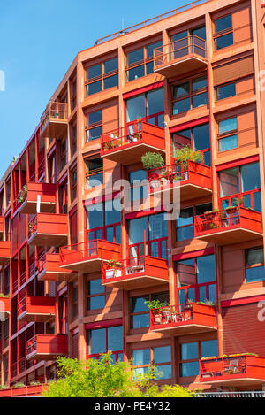 Red multi-family apartment house seen in Berlin, Germany Stock Photo