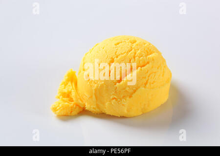 Mango sorbet ice cream scoop in scooper, square crop stock photo (147282) -  YouWorkForThem