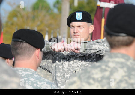 U.S. Army Reserve Chief Warrant Officer 2 William Green, leader of the 313th Army Reserve Band out of Birmingham, Ala., directs the band as they play during the Army Reserve Medical Command Change of Command Ceremony held Sept. 26, 2015, at the C.W. Bill Young Armed Forces Reserve Center in Pinellas Park, Fla. Stock Photo