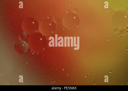 Oil bubbles in water Stock Photo