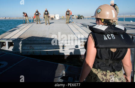 Acb Inls Sailors from Amphibious Construction Battalions 1 and 2 position an ...