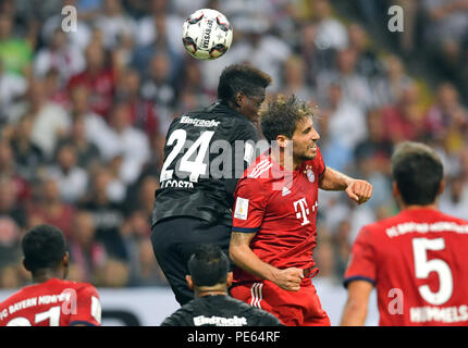 Frankfurt am Main, Germany. 12th Aug, 2018. Football: DFL-Supercup, Eintracht Frankfurt - Bayern Munich in the Commerzbank-Arena. Frankfurt's Danny da Costa (l) and Bayern's Javi Martinez in a header duel. Credit: Uwe Anspach/dpa - IMPORTANT NOTICE: DFL regulations prohibit any use of photographs as image sequences and/or quasi-video./dpa/Alamy Live News Stock Photo